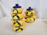 three lemons stacked on top of each other on a table