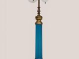 a blue lamp that has two lights on top of it