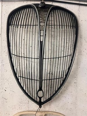 an image of a bird cage hanging on a wall