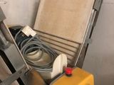 a yellow box with a hose and a yellow box with a hose and a yellow box with a hose and a yellow box with a yellow hose