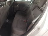 the back seats of a car are empty and the passenger seat is empty