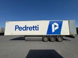 a semi truck that is parked in a parking lot