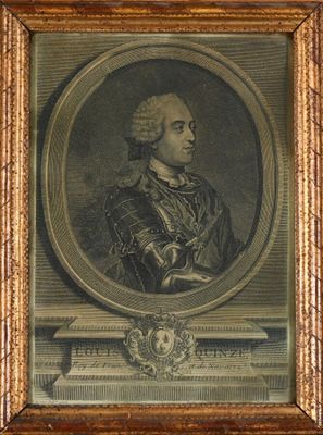 une vieille photo encadrée représentant un homme en armure