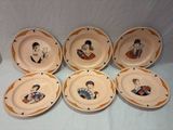 six plates with a picture of a man and a woman on them