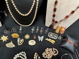a lot of jewelry on display on a table