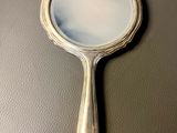 a mirror on the table with a reflection in it