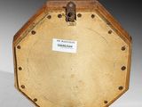 a small wooden box with a label on it