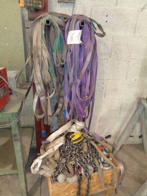a pile of tools sitting on the floor in a room