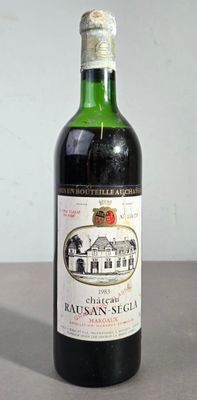 a bottle of wine that is sitting on a table