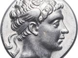 a close up of a coin with a woman ' s head on it