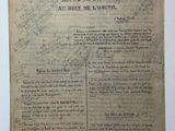 a piece of paper with writing on it sitting on a table