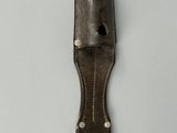 an image of a knife that is on a table