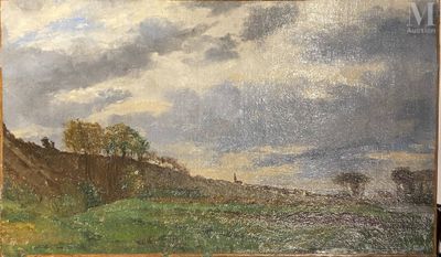 une photo d'un tableau représentant un paysage, posé sur une table