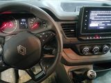 the interior of a car with a steering wheel, dashboard, and dash board