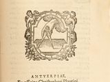 an old book with a picture of a bird on it ' s cover