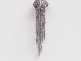 silver plated pendant with chain and tassels on white background