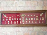 a picture of a picture of a wall with a lot of pins on it