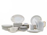 a lot of plates and cups on the table