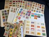 many different types of stamps on the pages of a book