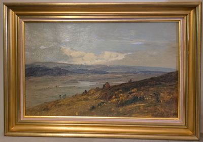 une image d'un tableau sur le mur d'une pièce