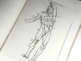 a book with a drawing of a man holding a tennis racquet