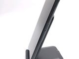 a cell phone that is sitting on a stand
