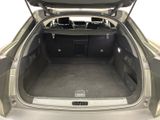 the back of a car with the trunk open and the seats down