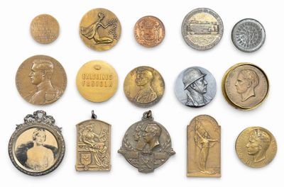 an image of a collection of medals and medals on a white surface