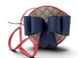 une image représentant un sac à main orné d'un nœud