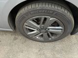 a close up of a tire on a car ' s rim