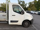 a white truck that is parked in a parking lot