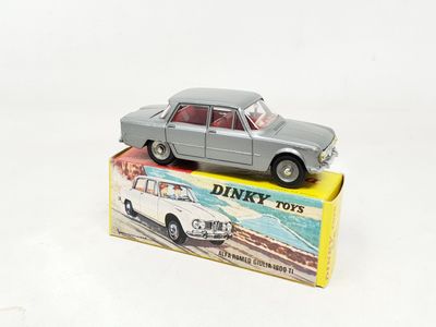 a small toy car sitting on top of a box