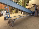an image of a conveyor belt in a warehouse
