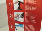 packaging of a red box with instructions on how to use scissors