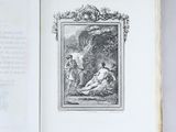 an open book with a picture of a man and a woman in a garden