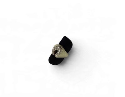an image of a black ring with a heart on it