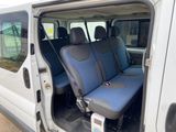 a white van with blue seats in the back of it