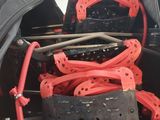 a pile of skis that are sitting in a bag