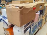a large box on top of a pallet in a warehouse