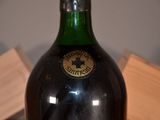 a bottle of wine that is sitting on a table