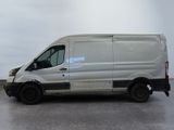 a white van that is parked in a room