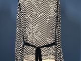 a black and white blouse with a chevron pattern on a mannequin mannequin mannequin mannequin mannequin mannequin manne