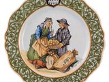 a plate with a picture of a man and a woman on it