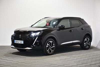 a black suv parked in a room with a checkered floor