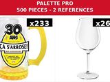 a glass of wine and a beer mug on a table