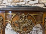 a table that has a marble top on it