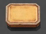 un coffret en or 18 carats serti de diamants