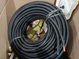 a box with a bunch of hoses inside of it