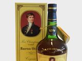 a close up of a bottle of liquor next to a box