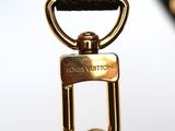 an image of a close up of a purse with a chain
